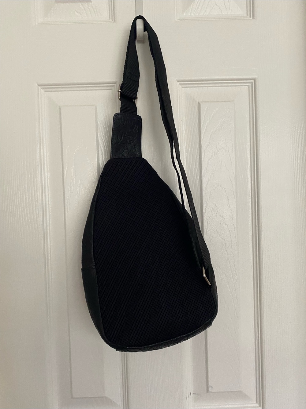 Black Sling Backpack Crossbody Bag Textured fabric.  Measures 11 x 7.